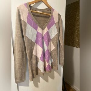 Long sleeve sweater V-neck and argyle pattern in purple, white, and pink.